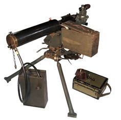 an old movie camera and other items on a tripod