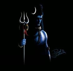 a woman holding a pole with two horns on it's head in the dark