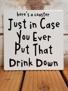 a sign that says, here's a coaster just in case you ever put that drink down