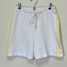 Adult M-L Tag size L-XL but runs smaller Cotton poly Terrycloth  28-38" waist 42" hips 16" length 5.5" inseam Vintage 70s terrycloth shorts in white with pastel yellow stripes down the sides. In great vintage condition, some minor marks on the front but nothing major. Pastel Yellow, Vintage Shorts, Yellow Stripes, Terry Cloth, Vintage 70s, Short Outfits, Favorite Outfit, Art Collection, Bathing Beauties