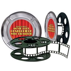 three different types of film reels and one has a red light on it's side