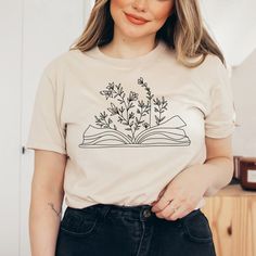 Bookish T-shirt With Funny Print, Spring Bookish Style Short Sleeve T-shirt, Bookish Short Sleeve Tops For Spring, Spring Bookish Short Sleeve Tops, Spring Bookish Short Sleeve T-shirt, Bookish Short Sleeve T-shirt For Spring, Bookish T-shirt With Funny Print And Short Sleeves, Spring Cotton T-shirt With Bookish Style, Spring Bookish T-shirt With Letter Print