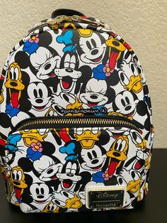 brand new with tags Disney Character Print Multicolor Bags, Disney Multicolor Bags With Adjustable Strap, White Mickey Mouse Backpack For Travel, White Mickey Mouse Travel Backpack, Themed Multicolor Bags With Character Print, Themed Multicolor Character Print Bags, Multicolor Character Print Backpack, Multicolor Character Print Standard Backpack, Cute Multicolor Backpack For Disney Trips