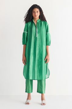 Green cotton linen woven kurta with water color striped digital print. Comes with pant.
Components: 2
Pattern: Digital printed
Type Of Work: Woven, Water color striped
Neckline: Mandarin collar
Sleeve Type: Half
Fabric: Cotton linen
Color: Green
Other Details: 
Scalloped detailing and Side pockets on kurta
Occasion: Mehendi and Haldi - Aza Fashions Striped Kurta, Striped Pants Women, Striped Print Dresses, Kurti Style, Kurta Patterns, Striped Pant, Kurta Neck Design, Kurti Designs Party Wear, Sleeves Designs For Dresses