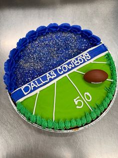 a cake that is decorated to look like a football field