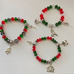 Super Cute Christmas Stretch Charm Bracelets. Made With Glass Beads And Tibetan Silver Charms. So Cute On!! Approximately 7.5 Inches. Average Size. Give As Gifts Or Even Keep One For Yourself. Comes In Gift Packaging Too. Bundle And Save More Christmas Theme Bracelets, Beaded Bracelets For Christmas Party, Christmas Party Beaded Bracelets, Christmas Bracelet Ideas Glass Beads, Christmas Bead Bracelet Ideas, Christmas Jewelry Diy Bracelets, Beaded Christmas Jewelry, Christmas Bracelets Beaded, Xmas Bracelets