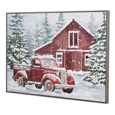 an old red truck is parked in front of a barn and trees with snow on the ground