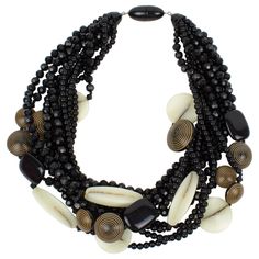 This refined Angela Caputi, made-in-Italy resin choker necklace features an oversized multi-strand design with a dominant black color contrasted with chocolate brown and cream-white tones. The black resin beads are faceted and are complemented by large resin beads with ethnic carved designs, imitating wood. Her color matching is always extremely classy, perfect for casual or fancy occasions. As you know, Caputi jewelry is not signed. This is a pre-owned necklace without its plastic branded tag, Resin Choker, Lucite Jewelry, Choker Collar Necklace, Multi Sapphire, Diamond Choker, Black Resin, Carved Designs, Modern Necklaces, Resin Necklace