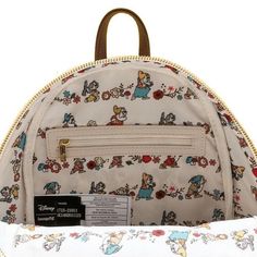 Officially Licensed Disney Bag Faux Leather with Printed Details. Adjustable shoulder straps. Top carry handle. Printed fabric lining. Measures: 9" W x 10.5" H x 4.5" D This backpack features exterior appliqué and embroidered details, a main zip compartment, front zip compartment, interior lining with an allover element symbols pattern, an interior zip pocket, metal plaque, and adjustable straps. Approx. 9" x 11" x 5" // // // a.mxe)&&f){a.ter.push(f);b=b||{};var c=f.logLevel||b.logLevel;c&&c!== Scene Backpack, Element Symbols, Snow White And The Seven Dwarfs, Drinking Accessories, The Seven Dwarfs, Disney Bag, Seven Dwarfs, Women Bags Fashion, Metal Plaque