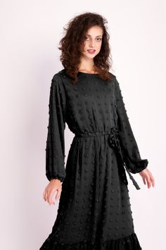 From dinner parties to special Eid holidays, the Boho Long Sleeve Pompom Maxi Dress is the perfect daily attire for every occasion. The beautiful black or brown dress features a subtle pompom design that adds a cute, trendy touch. Finished with a waist-cinching belt and a bottom tier effect, this modest lovely dress adds personality and texture to your wardrobe. Flowy Belted Maxi Dress For Party, Chiffon Belted Dress For Party, Chiffon Tie Waist Maxi Dress, Chiffon Maxi Dress With Tie Waist, Chiffon Maxi Length Dress With Tie Waist, Chiffon Tie Waist Dress For Party, Chiffon Tie Waist Party Dress, Chiffon Party Dress With Tie Waist, Spring Party Maxi Belted Dress