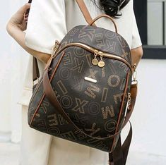 Trendy Everyday Backpack With Letter Print, Trendy Letter Print Backpack, Trendy Daily Use Backpack With Letter Print, Trendy Daily Backpack With Letter Print, Trendy Brown Outdoor Backpack, Trendy Brown Backpack For Outdoor, Travel Backpack With Letter Print, Backpack For Travel, Large Capacity Backpack