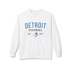 This Detroit Football Crewneck is a stylish and comfortable way to show your support for your favorite football team! Whether you're heading to the game or just lounging at home, this crewneck is sure to keep you warm and looking great. .: 80% Ringspun cotton, 20% Polyester (fiber content may vary for different colors) .: Medium-heavy fabric (8.4 oz/yd² (285 g/m .: Classic fit .: Tear-away label Football Crewneck, Vintage Detroit, Football Sweatshirt, Football Team, Heavy Fabric, The Game, San Jose, Crewneck Sweatshirt, Crew Neck Sweatshirt