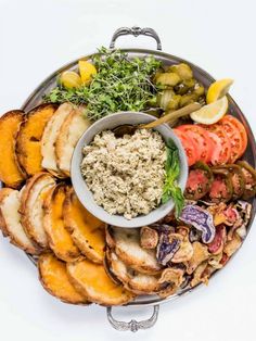 a platter filled with different types of food