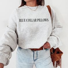 This trendy funny blue collar pillows sweatshirt would be so cute for any blue collar SO! Style this funny sweatshirt with some jeans for an easy, cute outfit! This classic unisex heavy blend crewneck sweatshirt is pure comfort. Fuzzy inside makes it oh so cozy! ☻ THIS IS A PHYSICAL ITEM! ☻ * 50% cotton & 50% polyester * Adult Unisex * Medium weight fabric (8.0 oz/yd²) * Gildan brand * Crew Neck ☻ SIZING ☻ PLEASE CHECK THE SIZE CHART IMAGE TO HELP YOU CHOOSE THE BEST FIT! WE DO NOT ACCEPT EXCHANGES, RETURNS OR CANCELLATIONS. Once an order is received it goes straight into production and we are unable to cancel orders or make changes. DESIGN SIZE IS SCALED DOWN ON SIZES S & M BUT REMAIN THE SAME SIZE ON SIZES L, XL & 2XL ☻ CARE INSTRUCTIONS ☻ -Turn garment inside out. -Machine wash cold. -L Bold Serif Fonts, Colorful Sweatshirt, Pull Bebe, Emergency Nursing, Nurse Sweatshirt, Santa Baby, How To Measure, Look At You, Modern Retro