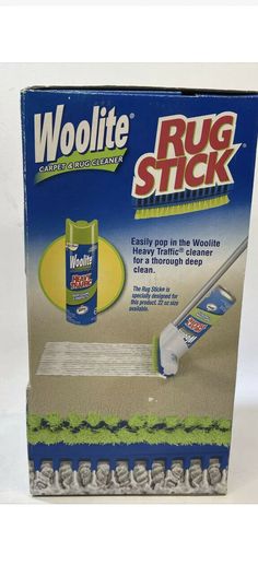 a package of woolite rug stick with the box open and cleaning mop inside