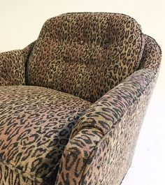 the leopard print chair is upholstered and ready to be used