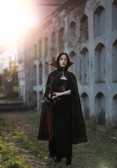 This high quality vampire / gothic / victorian / medieval cloak with a high collar is made out of pure black wool and lined with red cotton (which ensures quality, durability and practical use as wool provides warmth and weather protection). It is perfectly suitable for many occasions such as thematical weddings, Halloween parties, photoshoots, LARPs, masquerades and so on. This cloak is both practical (wool provides warmth and weather protection) as well as creates a captivating image.

https://sagittariuscraft.etsy.com

#vampire #vampirewoman #gothic #victorian #highcollar #cloak #medieval #fantasy #gothgirl #steampunk #alternative