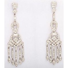 These delightful gems dance on the ear.  The earrings have 5.26 carats of diamonds set in 18k white gold.  Please see the measurements noted above in the description for best approximate dimensions Dazzling Diamond Chandelier Earrings For Formal Occasions, Formal Diamond Cut Chandelier Earrings, Elegant Platinum Earrings With Baguette Diamonds, Elegant Platinum Diamond Earrings With Baguette Diamonds, Elegant Platinum Baguette Diamond Earrings, Brilliant Cut Diamond Chandelier Earrings For Evening, Classic White Gold Diamond Chandelier Earrings, Evening Brilliant Cut Diamond Chandelier Earrings, White Gold Chandelier Earrings With Brilliant Cut For Evening