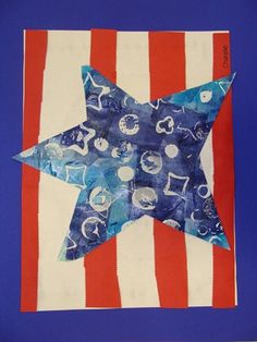 a blue and white star with red, white, and blue stripes on it's side