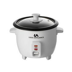 an electric rice cooker with the lid open