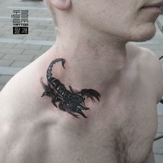 a man with a scorpion tattoo on his chest