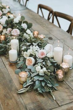 an instagram page with candles and flowers on the table, which is being used as a wedding centerpiece