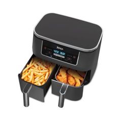 an air fryer with two trays filled with food