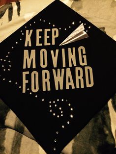 a cap that says keep moving forward on it