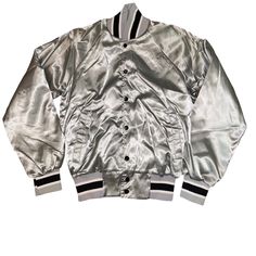 Vintage Win Wear Silver Grey Black Nylon Bomber Jacket Size Mens Small Size: Men’s Small Condition: 9/10 Been In Storage Looks Brand New No Tags. No Rips Or Stains. Just Wrinkly From Storages . Notes: Men’s Vintage Win Wear Silver Grey Nylon Satin Like Jacket . With Black And White Striped Cuffes. Has Pockets . Button Down Front . No Branding . Made In Usa. Measurements Top To Bottom- 25 Inches Pit To Pit- 19 Inches Arm Length-21 Inches Metallic Long Sleeve Outerwear For Streetwear, Sporty Silver Long Sleeve Outerwear, Silver Winter Outerwear For Streetwear, Casual Silver Winter Outerwear, Casual Silver Outerwear For Winter, Casual Silver Outerwear For Fall, Silver Casual Spring Outerwear, Black Nylon, Black Nylons