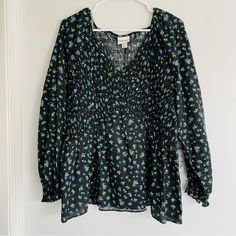 Ava & Viv Nwt Black Floral Smocked Peplum Top Brand New With Tags, Perfect Condition Women’s Size 1x Retail Price $30 Black Floral Design Black With Blue Green Yellow Gray Flower Patterns Neutral Top Perfect For Casual Wear Or Work V-Neckline 100% Cotton Measurements (Flat): Length 27.5”, Bust 19”, Sleeves 24”, V-Neckline 9” Reasonable Offers Welcome Best Price With Bundles 5 Star Poshmark Closet Since 2013 Style - #Casual #Neutral #Businesscasual #Work #Office #Career #Classy #Timeless #Minimal Black Smocked Top For Vacation, Black Smocked Back Top For Vacation, Black Top With Smocked Back For Vacation, Black Tops With Smocked Back For Vacation, Black Long Sleeve Blouse With Smocked Back, Spring Black Blouse With Smocked Cuffs, Black Smocked Blouse For Summer, Black Smock Long Sleeve Blouse, Black Long Sleeve Smock Blouse