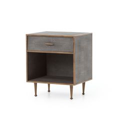 Mid-century shaping takes on modern intrigue in a grey resin faux shagreen. A perfectly cubed bedside table with a drawer for storage and antique brass finished accents. Shagreen Nightstand, Brass Grey, Antique Bedside Tables, Bedside Table Grey, Metal Nightstand, Faux Shagreen, Resin Frame, Studio Furniture, Gus Modern