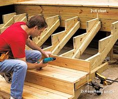 a man is working on some wooden steps