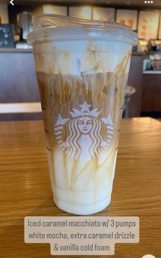 a starbucks drink with white mocha and caramel drizzle on the side