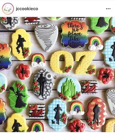 decorated cookies are displayed on a table