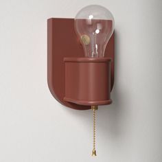 a light bulb mounted to the side of a wall