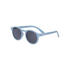 these award winning babiators' sunglasses come with 100% UV protection and flexible, durable frames. these shades have UV400 lenses that offer 100% UVA and UVB protection and undergo rigorous testing to ensure they're safe for your child whether they're on your child's face or end up in your child's mouth. available here in blue, these sunglasses feature flexible rubber frames and impact- and shatter-resistant lenses that won't break when you bend, twist, or step on them. Cheap Sunglasses, Blue Color Schemes, Sunglass Holder, Cool Sunglasses, Stylish Sunglasses, Baby Bag, Fashion Sunglasses, Baby Accessories, Pretty In Pink