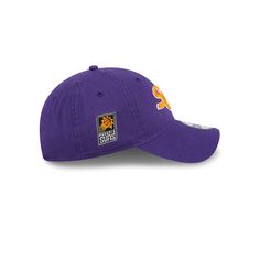 The Phoenix Suns Throwback 9TWENTY Adjustable Cap features an embroidered Suns wordmark at the front panels with a matching team logo patch at the right-wear side and an adjustable D-Ring closure at the rear. Collegiate Hats With Logo Patch For Game Day, Collegiate Baseball Cap With Logo Patch And Curved Brim, Collegiate Baseball Cap For Sports, Collegiate Baseball Cap With Curved Brim And Logo Patch, Sports Fitted Hat With Logo Patch And Curved Brim, Fan Merchandise Baseball Cap With Embroidered Logo, Casual Baseball Cap With Curved Visor For Fan Gear, Casual Baseball Cap With Curved Visor For Fans, Casual Curved Bill Fitted Hat For Fans