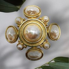 This Beautiful Vintage Givenchy Brooch Had A Loose Pearl, I Took It To A Jeweler He Secured The Loose Pearl, Checked All The Others And Cleaned The Piece - It's Gorgeous! Signed On The Back Paris Large Brooch Quatrefoil Style Resembling A Maltese Cross Creamy White Cabochon-Set With Large And Small Faux Pearls In A Gold Tone Setting. Rollover Clasp. 2 3/8” Diagonal And 2"W X 2"L Hallmarked On The Back In A Round Cartouche Gg And Paris New York Givenchy. Pin On The Back Is Slightly Bent And Has Some Plating Loss But Does Not Affect Its Function. J1 Givenchy Jewelry, Vintage Givenchy, Loose Pearls, Maltese Cross, New Paris, Bespoke Jewellery, Costume Jewelry, Faux Pearl, Givenchy