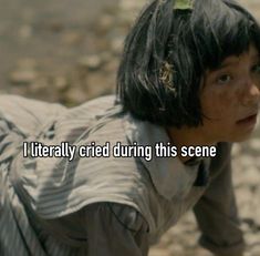 a young child is laying down on the ground with text that reads, i literally tried during this scene