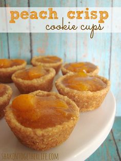 mini peach crisp cookie cups on a white plate