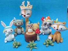 a group of toy animals sitting next to each other