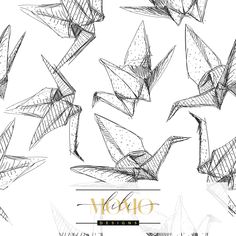 a bunch of origami birds flying in the air