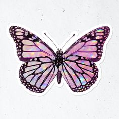 a purple and pink butterfly sticker sitting on top of a white surface with no background