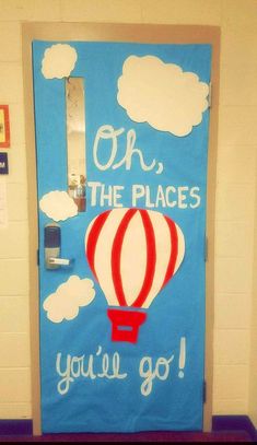 a door decorated with a hot air balloon and the words oh, the places you'll go