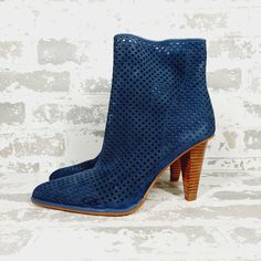 New Show Off Chic Style In This Pointed-Toe Bootie Constructed From Soft Suede With Latticed Cutouts And A Sculptural Cone Heel. Leather Upper/Textile Lining/Synthetic Sole Imported Blue Ankle-high Summer Boots, Blue Ankle-high Heels For Summer, High Heel Suede Boots For Summer, Summer Suede High Heel Boots, Suede High Heel Boots For Summer, Blue Ankle-high Heels With 4-inch Heel, Blue Round Toe Boots For Summer, Blue Ankle-high Boots For Spring, Blue Summer Boots With Round Toe