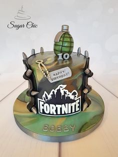 a birthday cake made to look like a fortnite helmet