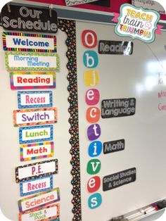 a bulletin board with words on it and magnets attached to the back of it