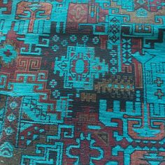 Turquoise blue southwestern, geometric, boho heavy chenille, upholstery fabric with accent colors of burgundy, gold and brown hues.  This ethnic, navajo fabric is woven, sturdy and could be used for chairs, ottomans, footstools, sofas, headboards and many more.  * Width: 55 inches/140 cm. * Weight: 430 gr/m2---12.66 oz/yd2 * Primary fiber : Acrylic * Secondary fiber : Cotton  This woven fabric in rich turquoise blue color with intricate pattern is a great fabric for statement upholstery.  The southwestern, geometric, boho heavy chenille upholstery fabric is suitable for: -chairs  -sofas -cushions  -pillow covers -headboards  -bedspreads  -bags -shoes -accessories  -coats -costumes -DIY Care Instructions for the ethnic, navajo fabric  * Gentle machine wash at max. 30oC/ 85oF * Color deterge Navajo Fabric, Southwest Fabric, Southwestern Fabric, Cushion Ottoman, Chair Couch, Headboard Cover, Turquoise Blue Color, Couch Cushion, Couch Cushions