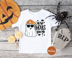 Hey there, spooktacular parents! If you're looking for the perfect Halloween shirt for your cute little guy, then check out our All the Ghouls Love Me cute ghost shirt. This attractive shirt features an adorable ghost character just waiting to join in the Halloween fun. With its festive and playful design, your boy will love flaunting his love for the haunting season.  All the Ghouls Love Me Ghost Shirt - Halloween Kids Shirt - Cute Ghost Shirt - Boys Halloween Tee - Trick or Treat Shirt ► SHIRT DETAILS: ☆ We use 100% cotton shirts and bodysuits ☆ Short Sleeve Shirts ☆ Shirts and bodysuits run true to size ☆ Design is printed directly to the shirt using a commercial Direct to Garment printer that uses kid safe inks that are water-based and non-toxic. HOW TO ORDER: - Select your size from t Boy Halloween Shirts, Ghost Character, The Ghouls, Halloween Shirts For Boys, Halloween Shirts Kids, Lil Bro, Halloween Boys, Boys Graphic Tee, Spirit Week