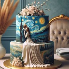 a wedding cake decorated with an image of a woman and the starry night painted on it